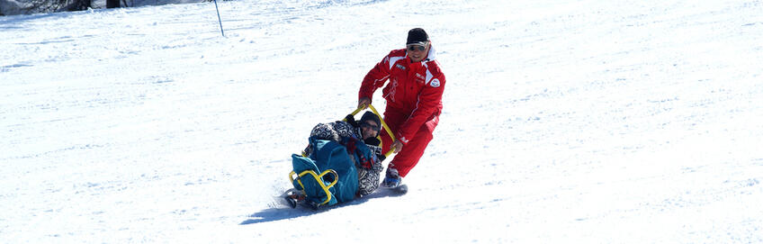 Handiski - fauteuil ski avec moniteur © ESF Pra Loup